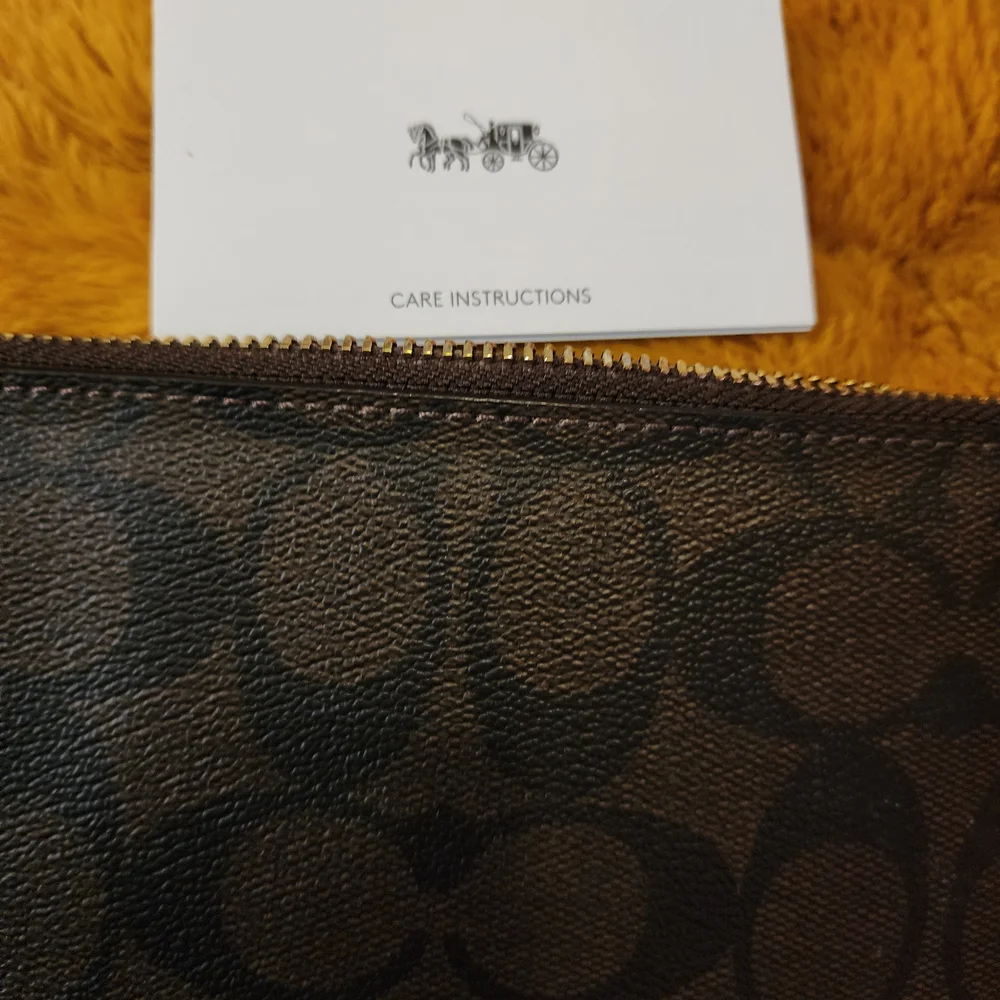 New Coach Brown and Pink Wristlet